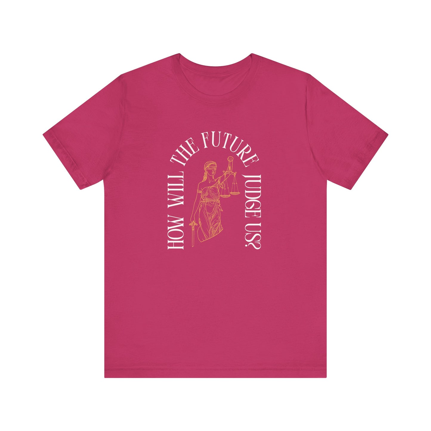 Hot pink t-shirt with sketch of lady justice and words in white arched around it "how will the future judge us?"
