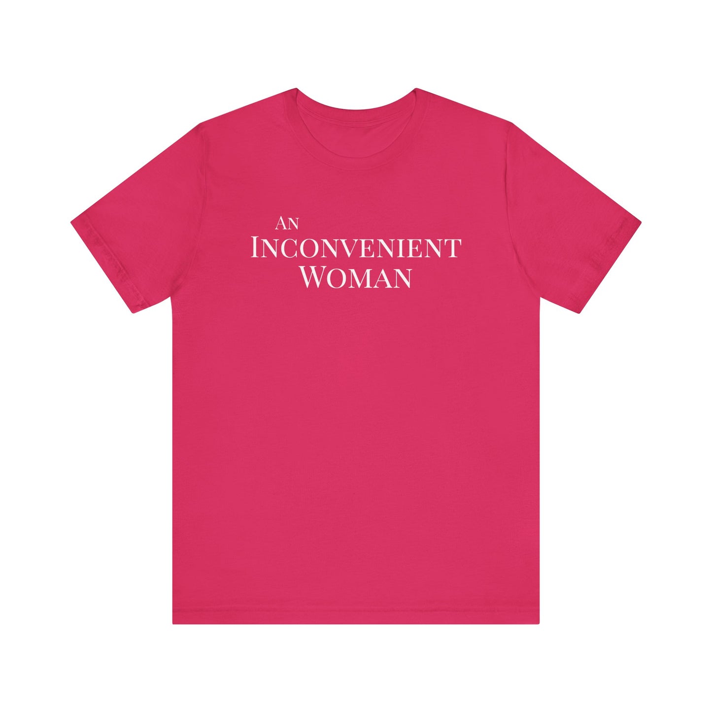 Hot pink t-shirt with white text "An Inconvenient Woman"