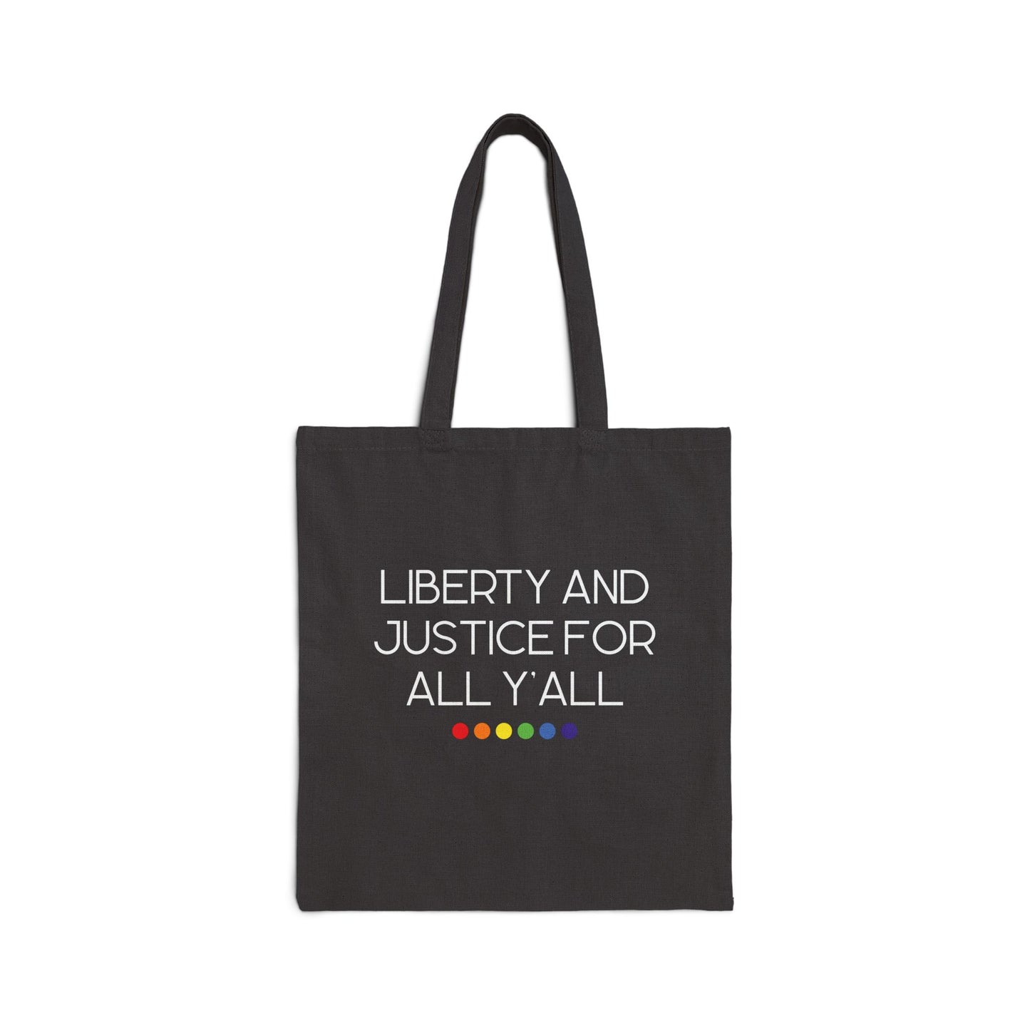 Black canvas tote bag with 'Liberty and Justice for All Y'all' white text and rainbow colored dots