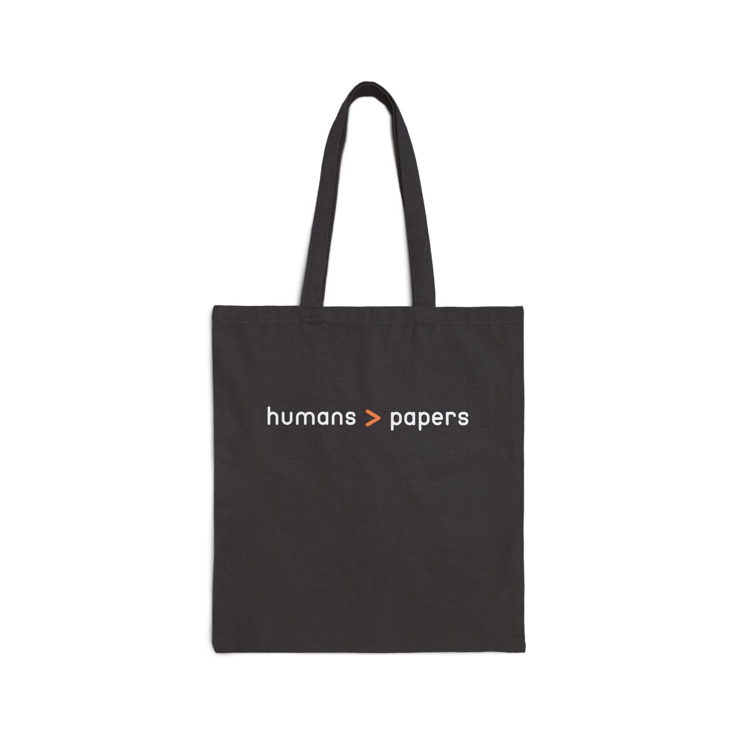 Black canvas tote bag with 'humans > papers' white text