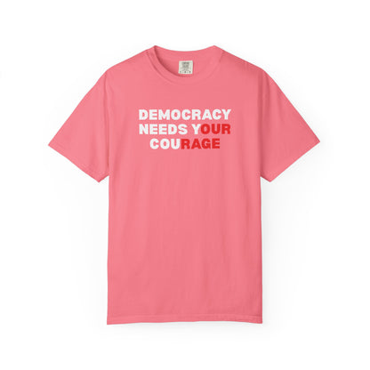 Pink unisex Comfort Colors t-shirt with 'Democracy Needs Your Courage' white and red text