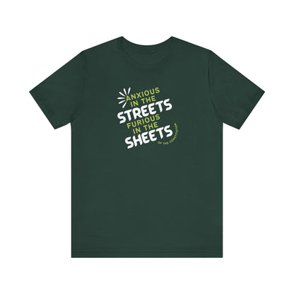 Forest green t-shirt with white and green text "anxious in the streets, furious in the sheets (of the constitution)"