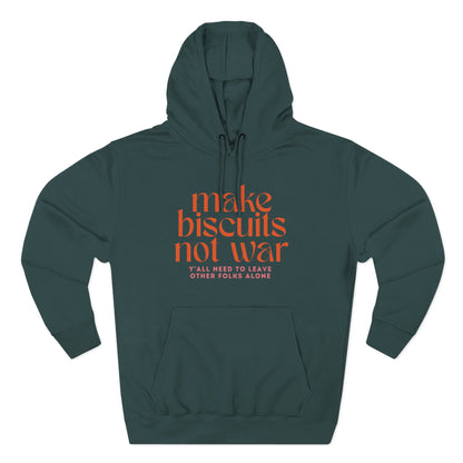 Green hoodie with orange text 'make biscuits not war' with smaller pink text "y'all need to leave other folks alone"
