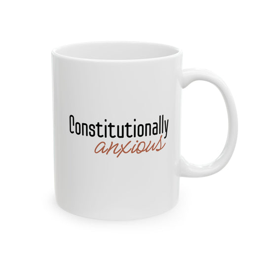 White 11 oz mug with 'Constitutionally anxious' text in black and orange