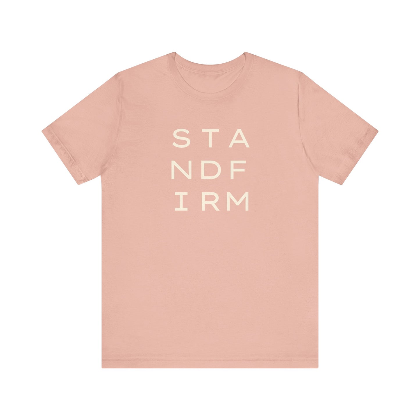 Light pink t-shirt with cream 'STAND FIRM' text 