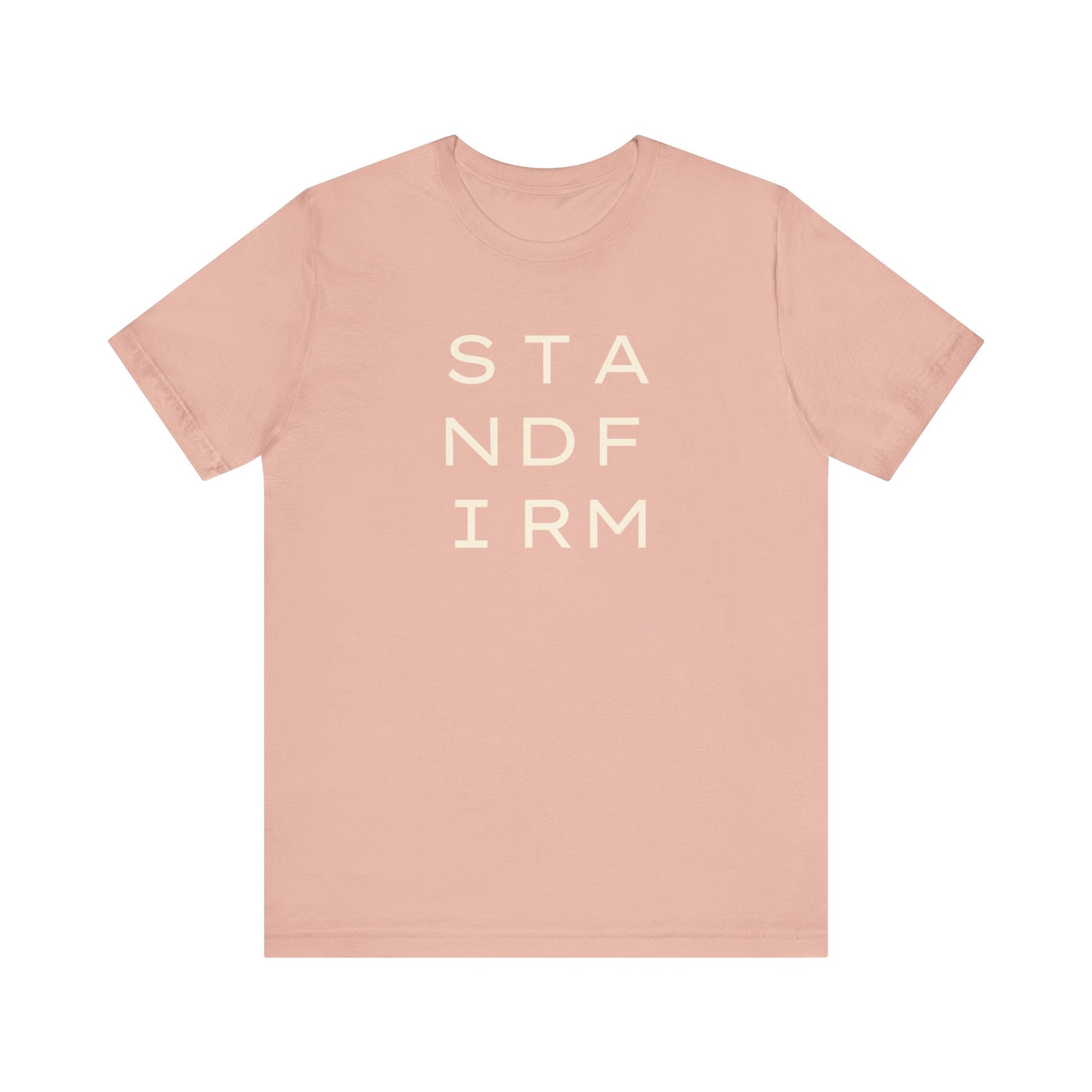 Light pink t-shirt with cream 'STAND FIRM' text 