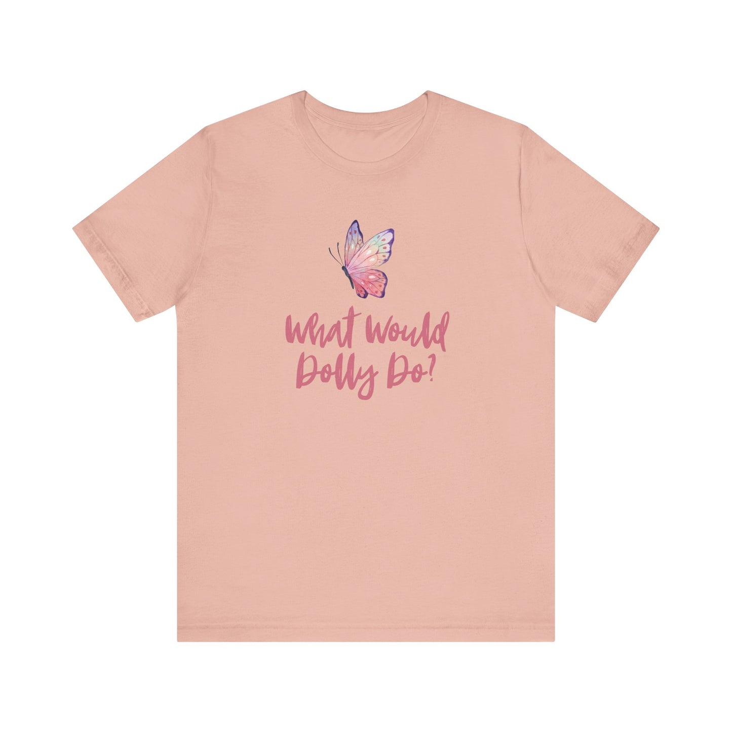 A peach-pink short-sleeve t-shirt with a butterfly graphic and the text 'What Would Dolly Do?' printed on the chest, displayed on a solid white background.