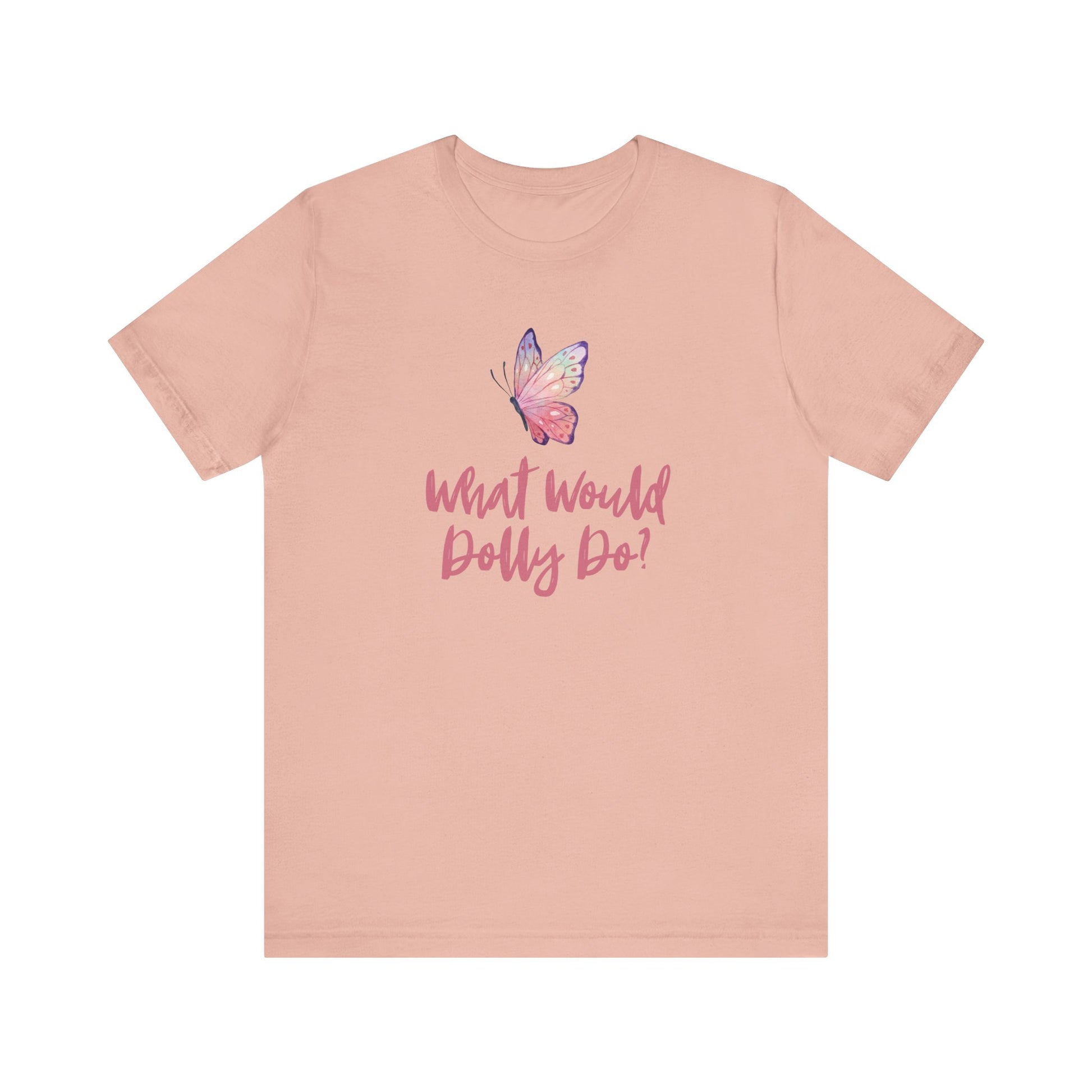 A peach-pink short-sleeve t-shirt with a butterfly graphic and the text 'What Would Dolly Do?' printed on the chest, displayed on a solid white background.