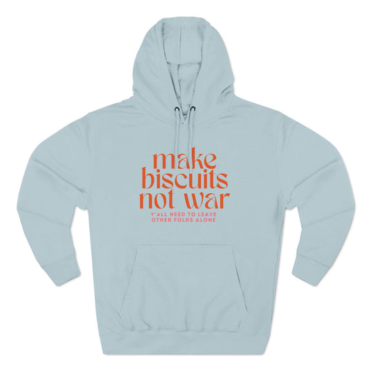 Light blue hoodie with orange text 'make biscuits not war' with smaller pink text "y'all need to leave other folks alone"