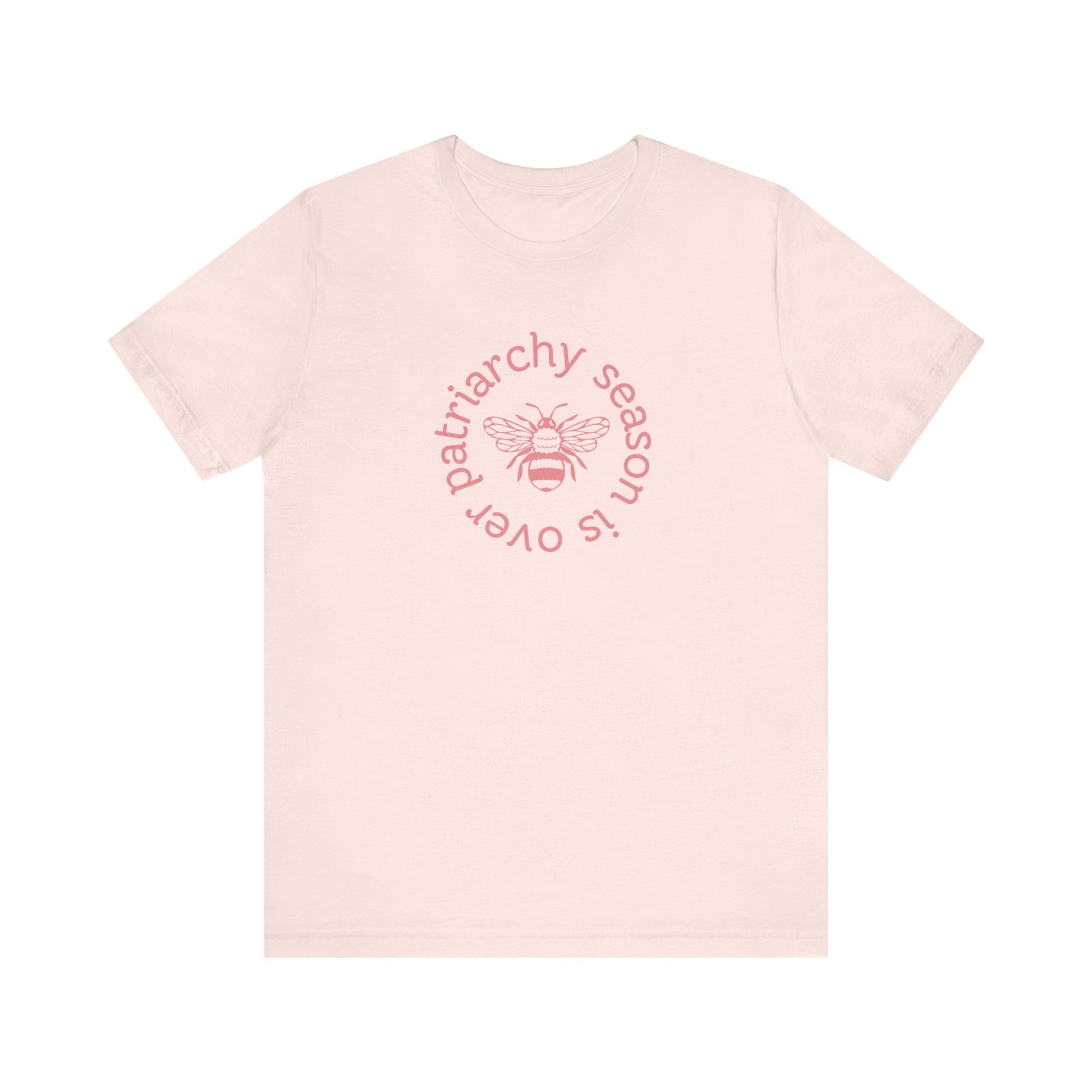 Pink unisex t-shirt with 'Patriarchy season is over' dark pink text and bee graphic