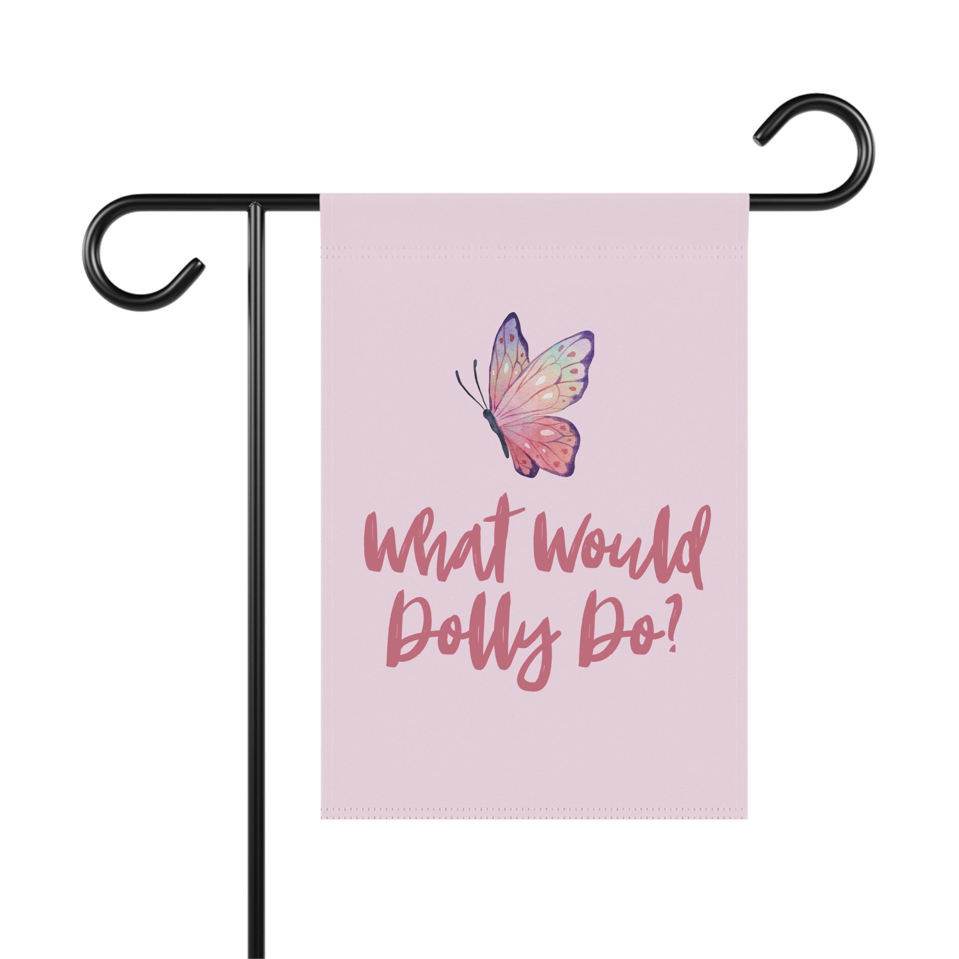A vertical garden flag on a black metal stand, featuring a pink background with a colorful butterfly and the text 'What Would Dolly Do!' in pink script.