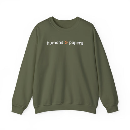 Military green unisex crewneck sweatshirt with 'humans > papers' white text