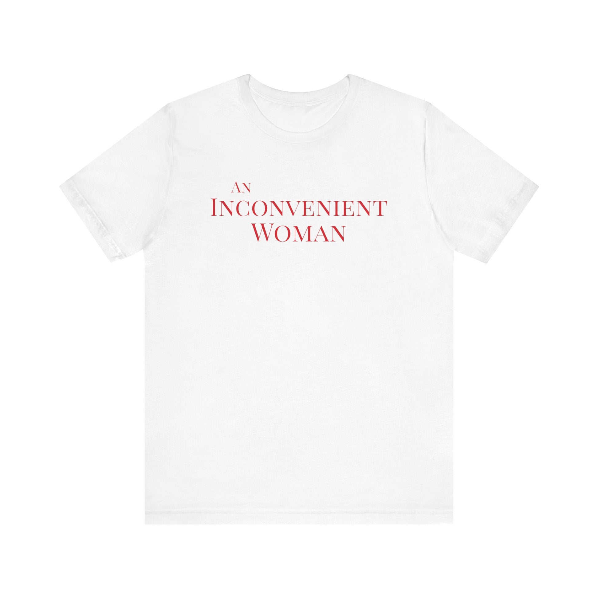White t-shirt with red text "An Inconvenient Woman"