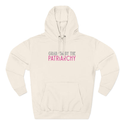 Beige hoodie with text 'Grab me by the Patriarchy' in white, black and pink