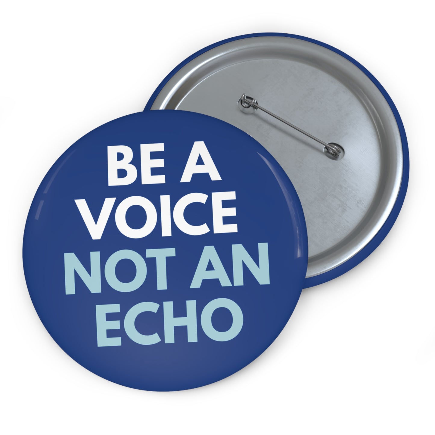 Navy blue pin button with "Be a voice, not an echo" white and light blue text