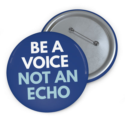 Navy blue pin button with "Be a voice, not an echo" white and light blue text