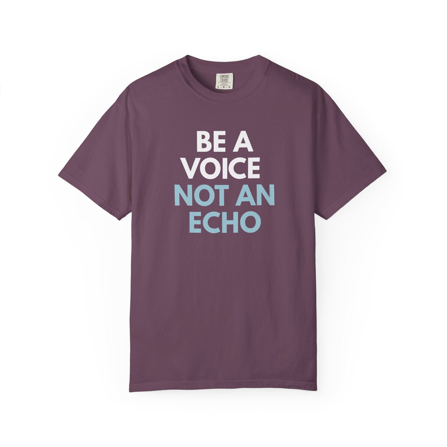 Berry purple unisex Comfort Colors t-shirt  with “Be a Voice, Not an Echo" blue and white text
