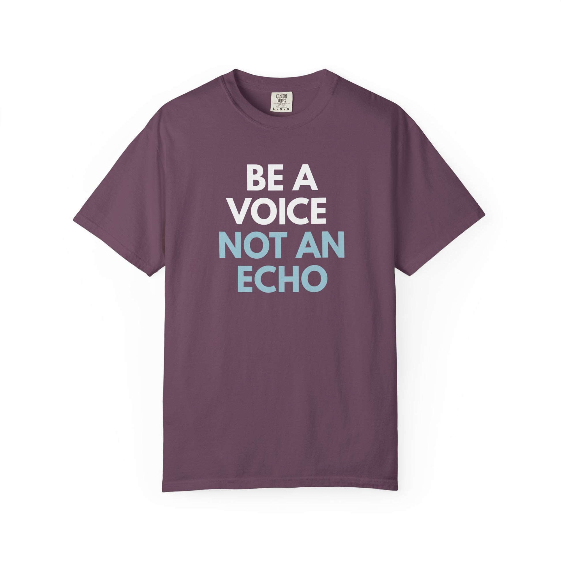 Berry purple unisex Comfort Colors t-shirt  with “Be a Voice, Not an Echo" blue and white text
