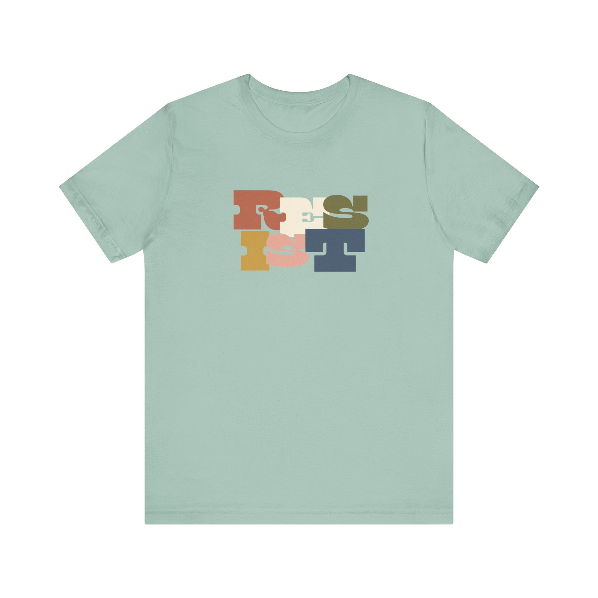 Light green t-shirt with colorful 'RESIST' graphic 