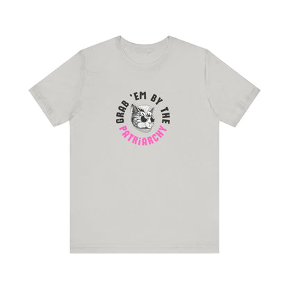 Light gray t-shirt with punk rock graphic design and black and hot pink text "grab 'em by the patriarchy"
