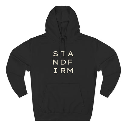 Black hoodie with 'STAND FIRM' cream text