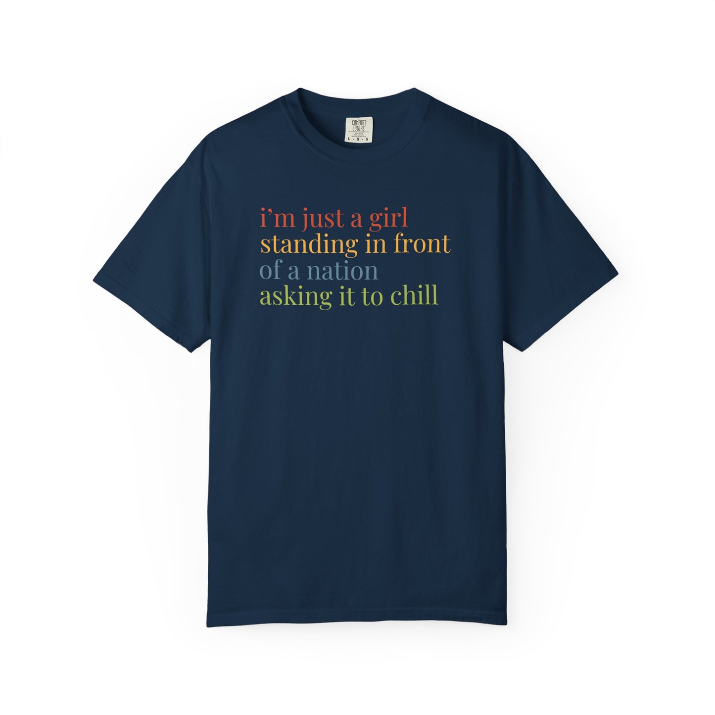 Navy blue t-shirt with colorful text "i'm just a girl, standing in front of a nation, asking it to chill"