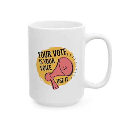 White 15 oz mug with a graphic of a megaphone and text 'Your vote is your voice. Use it!' 