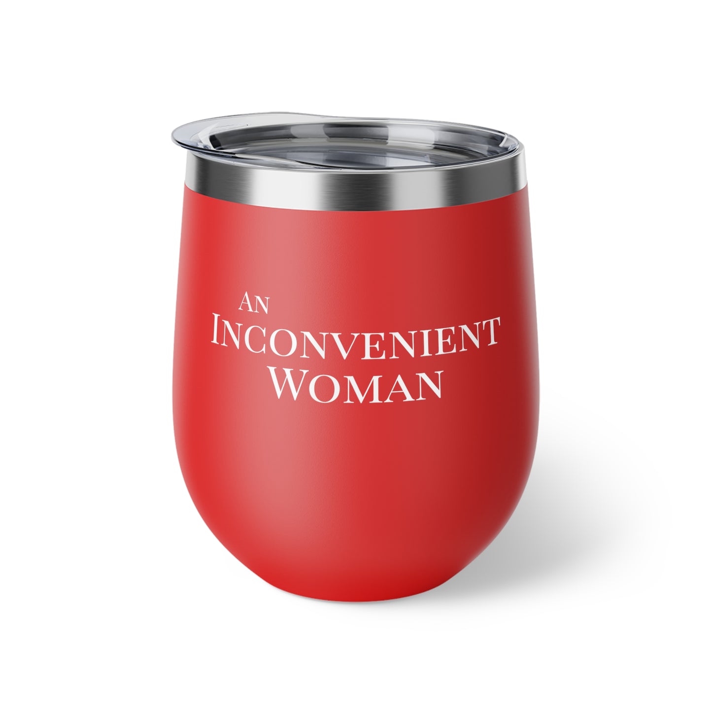 Red tumbler with white text "An Inconvenient Woman"
