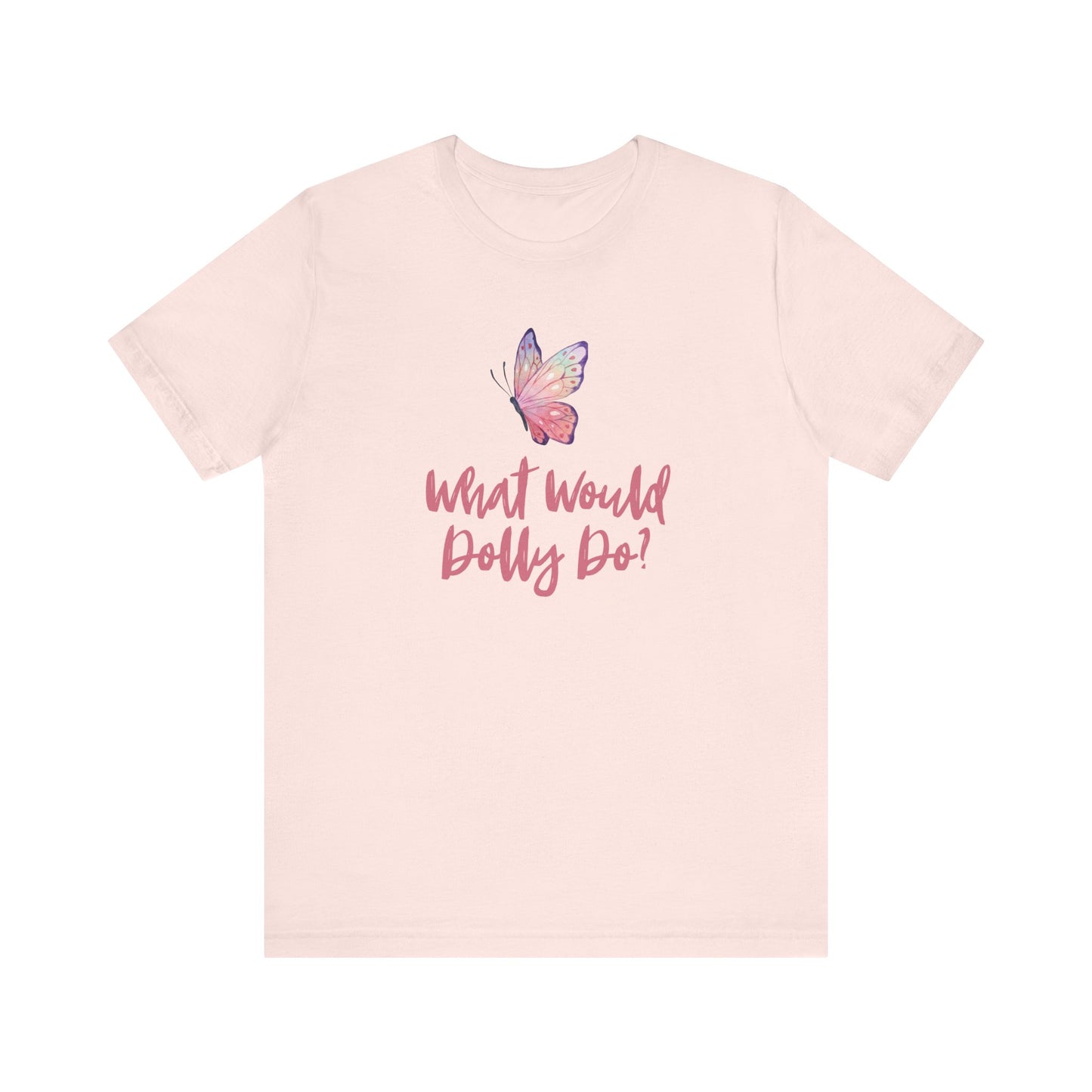 A light pink short-sleeve t-shirt with a graphic on the chest featuring a purple and pink butterfly above the cursive text 'What Would Dolly Do?' in pink, shown against a plain white background.