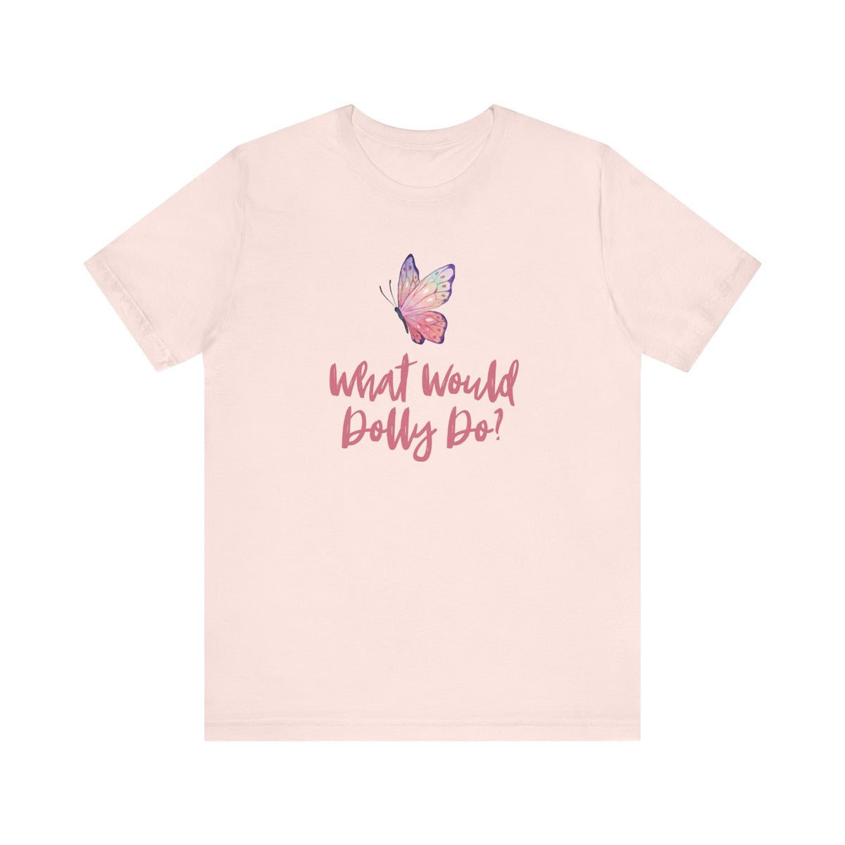 A light pink short-sleeve t-shirt with a graphic on the chest featuring a purple and pink butterfly above the cursive text 'What Would Dolly Do?' in pink, shown against a plain white background.