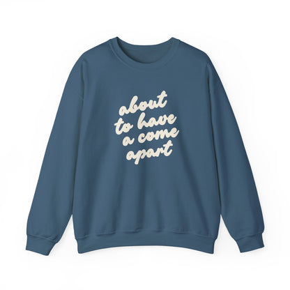 Indigo blue sweatshirt with "about to have a come apart" in cream text
