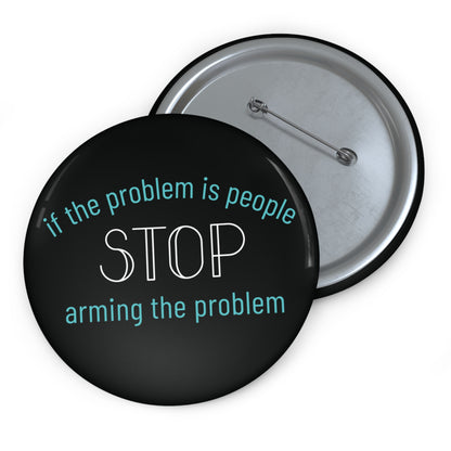 Black pin button with "if the problem is people, stop arming the problem" aqua and white text