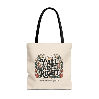 Cream tote bag with black handles with 'Y'all Ain't Right' graphic design
