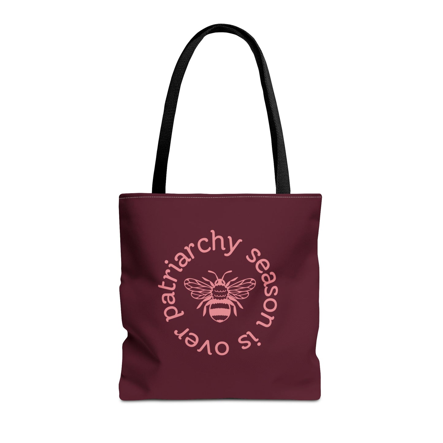 Maroon tote bag with black handles with pink "patriarchy season is over" text circling around a queen bee graphic 