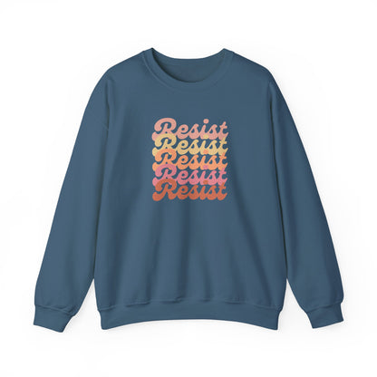 Indigo blue unisex crewneck sweatshirt with 'Resist' printed in gradient colors 