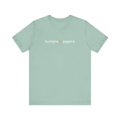 Light green t-shirt with 'humans > papers' white and orange text