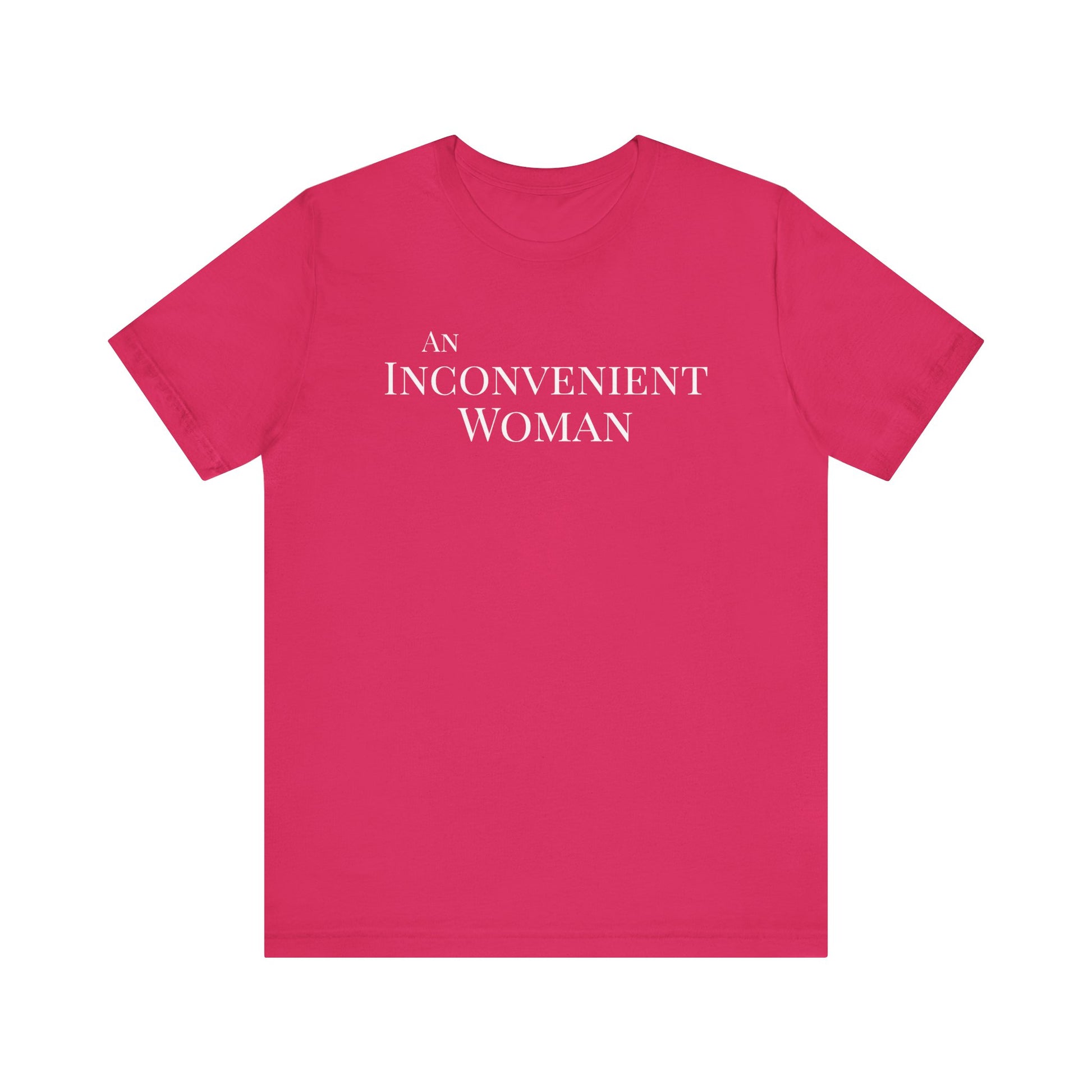 Hot pink t-shirt with white text "An Inconvenient Woman"