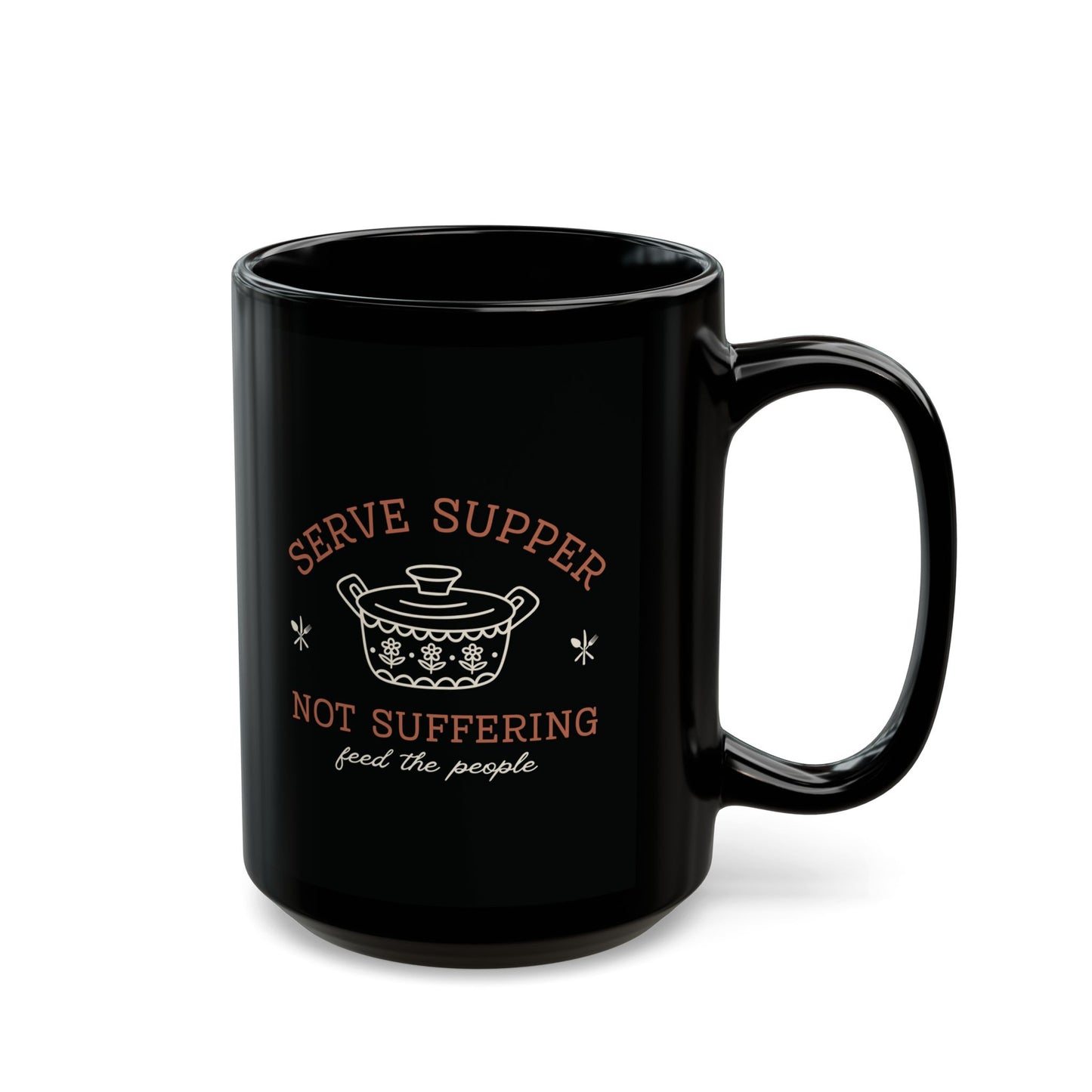 Black 15 oz mug with white vintage pyrex illustrated graphic and dark orange and white text "serve supper, not suffering, feed the people"