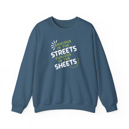 Indigo blue unisex crewneck sweatshirt with "anxious in the streets, furious in the sheets (of the constitution)" lime green and white text