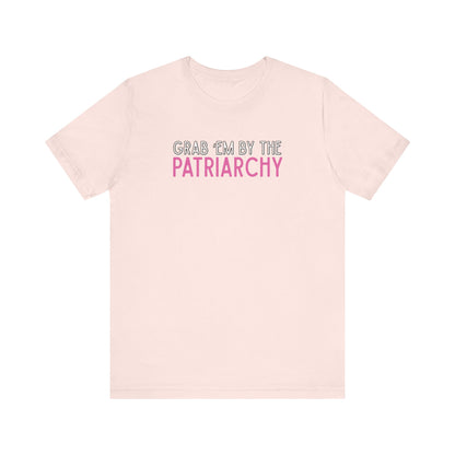 Pink t-shirt with black and hot pink text 'Grab em by the Patriarchy' 
