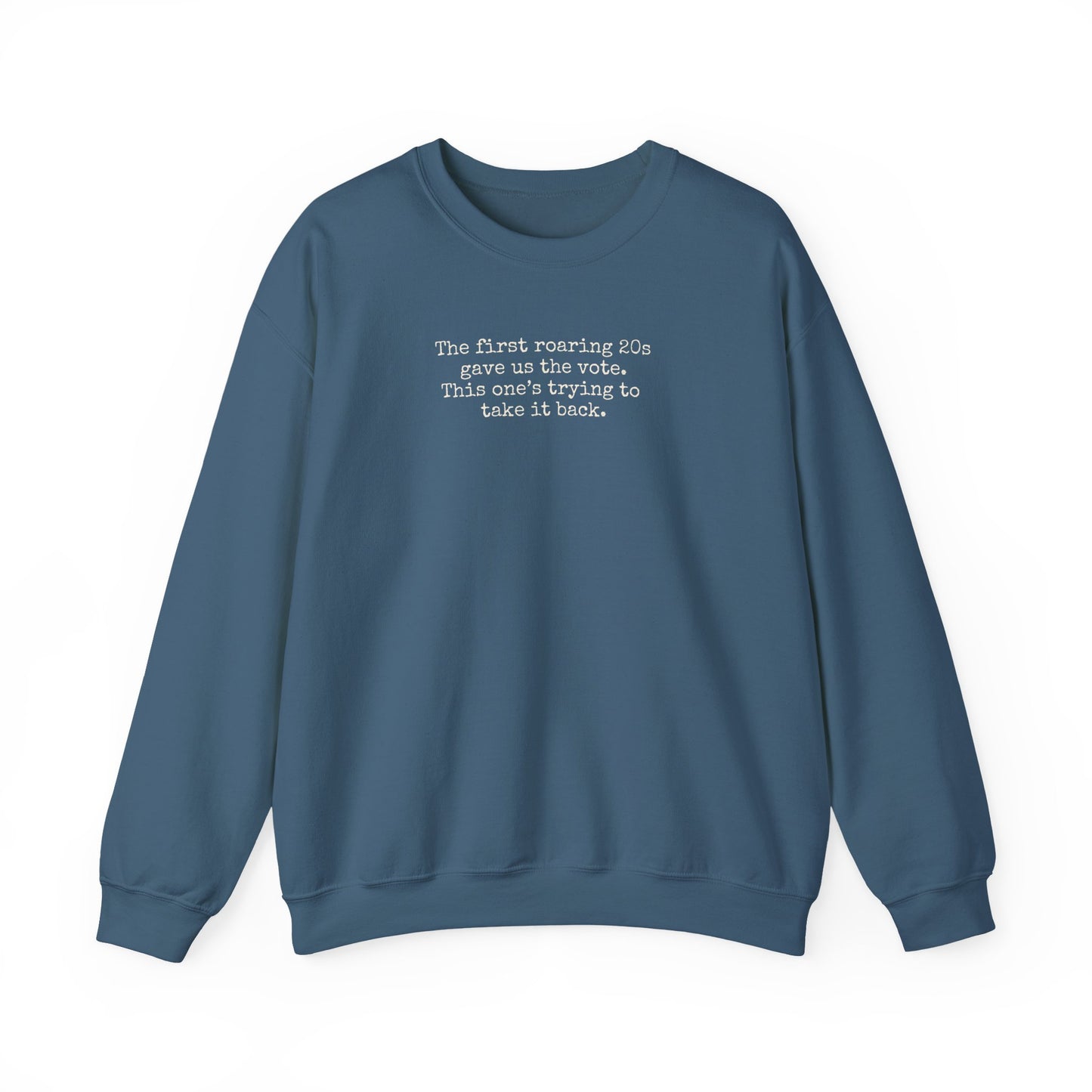 Indigo blue unisex crewneck sweatshirt with "the first roaring 20s gave us the vote. This one's trying to take it back" cream text