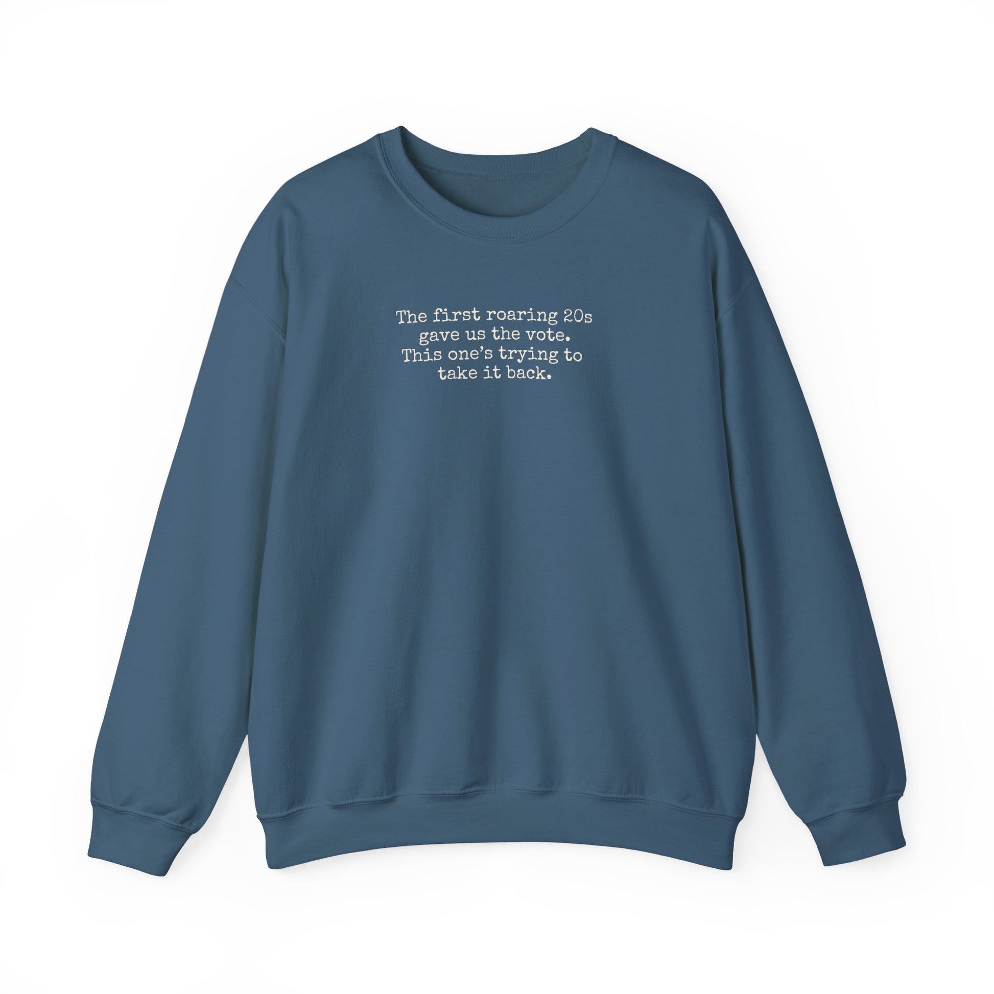 Indigo blue unisex crewneck sweatshirt with "the first roaring 20s gave us the vote. This one's trying to take it back" cream text