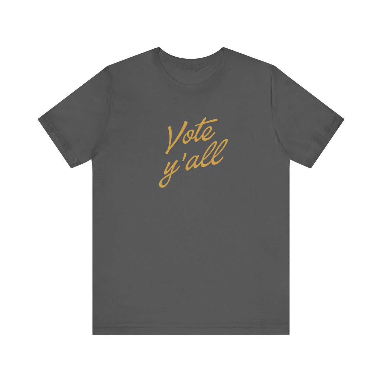 A dark gray crewneck t-shirt with 'Vote y'all' printed in a gold cursive script across the chest, displayed on a solid white background.