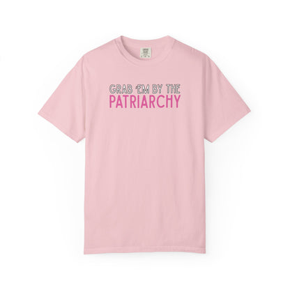Light pink unisex Comfort Colors t-shirt with 'GRAB EM BY THE PATRIARCHY' white, black and pink text