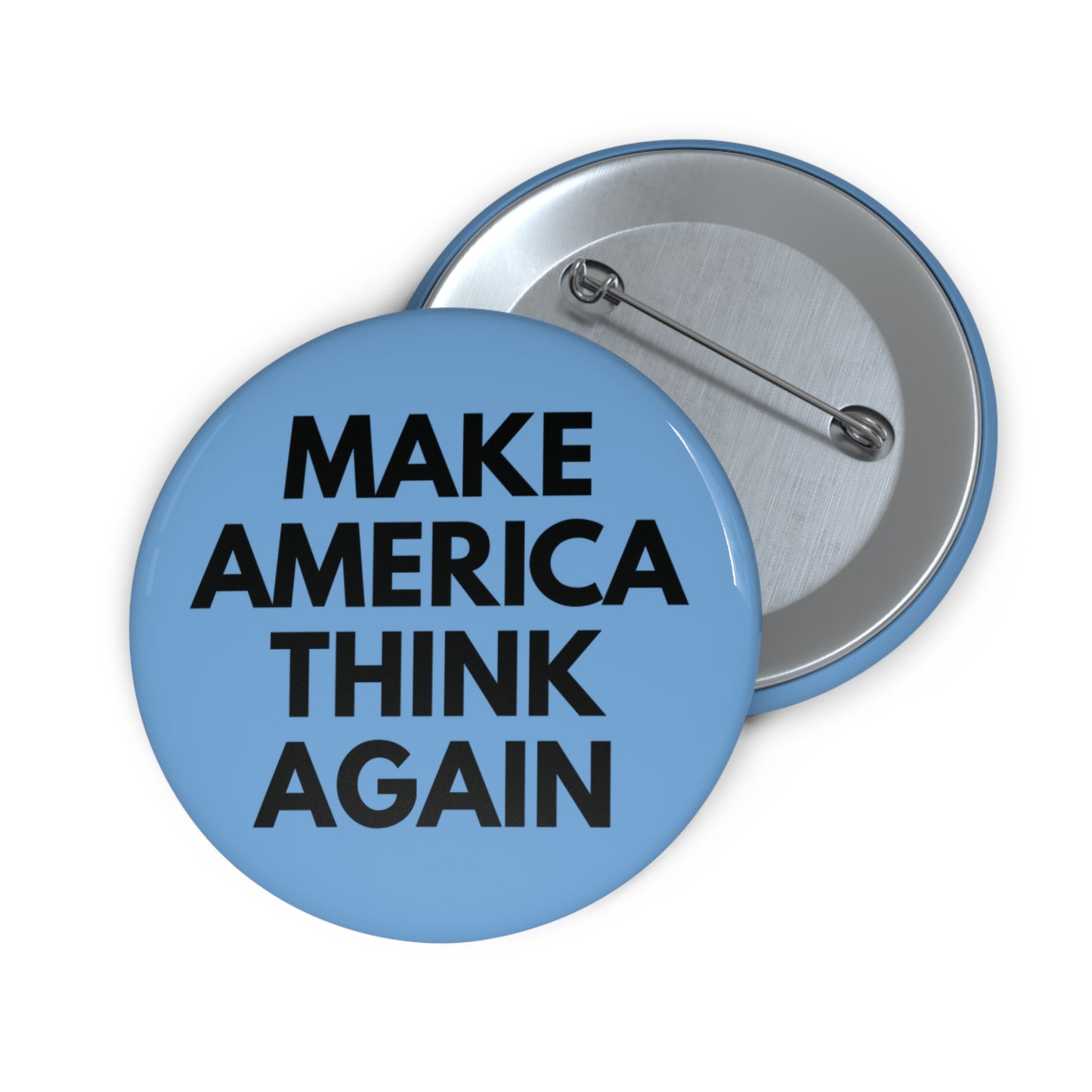 Light blue pin button with 'MAKE AMERICA THINK AGAIN' black text