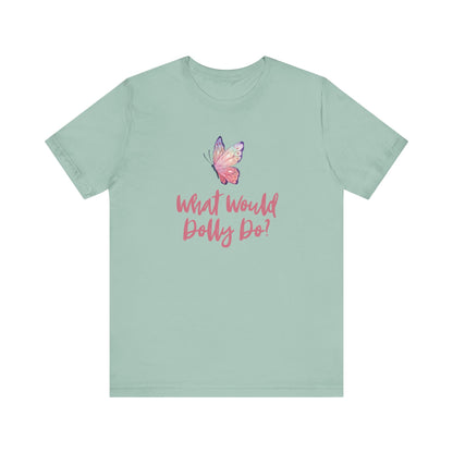 A mint green short-sleeve t-shirt with a pink butterfly graphic and the text 'What Would Dolly Do?' printed on the chest, displayed against a solid white background.