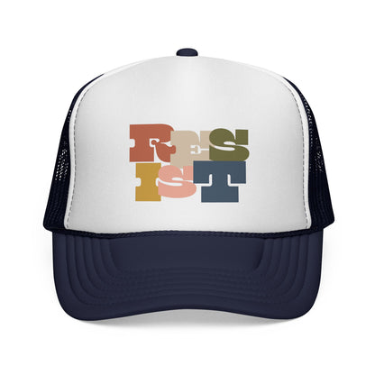 Navy blue and white trucker hat with colorful "Resist" text 