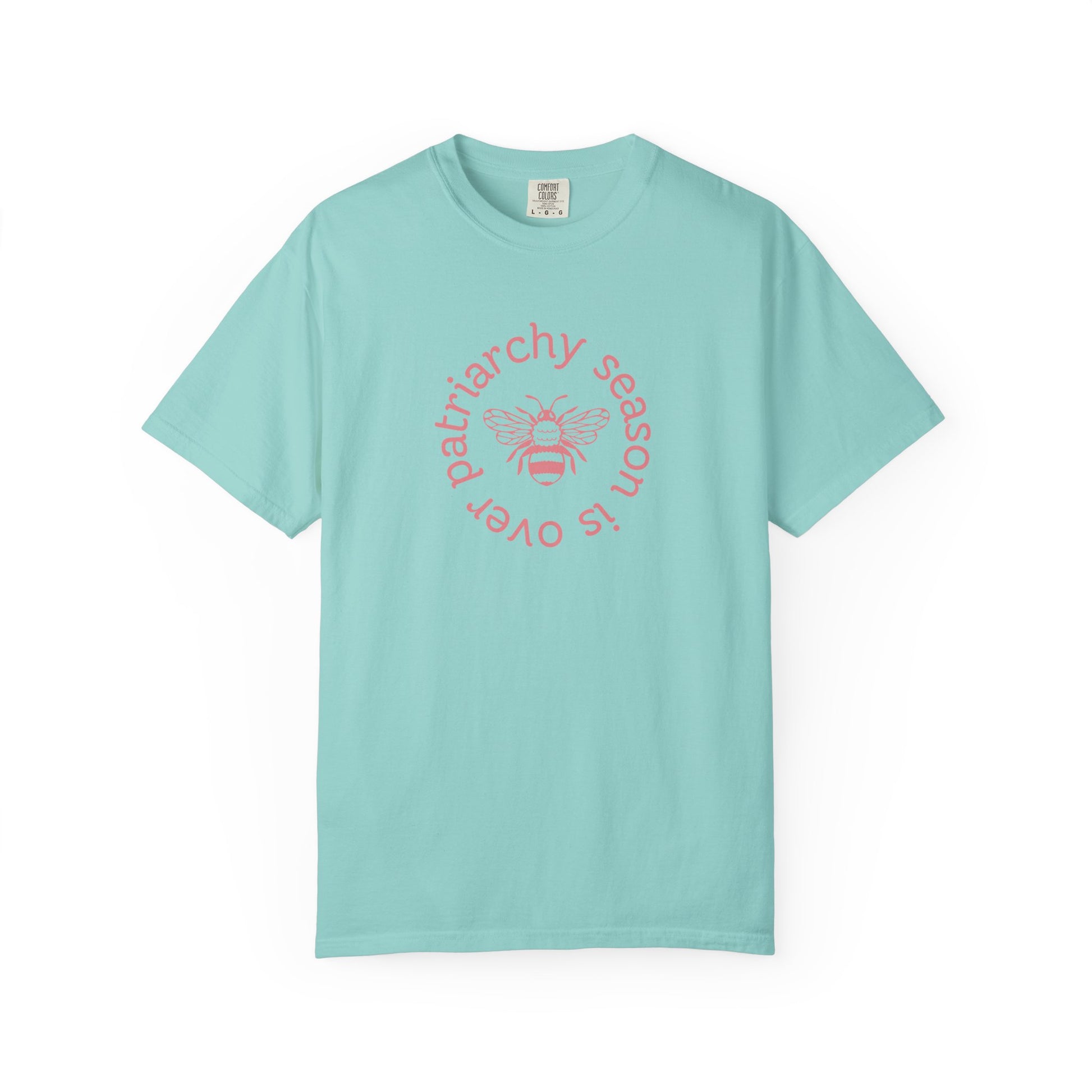 Light aqua unisex Comfort Colors t-shirt pink "patriarchy season is over" text circling around a queen bee graphic 