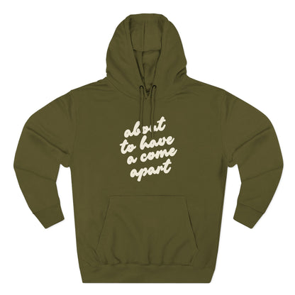 Green hoodie with "about to have a come apart" in cream text