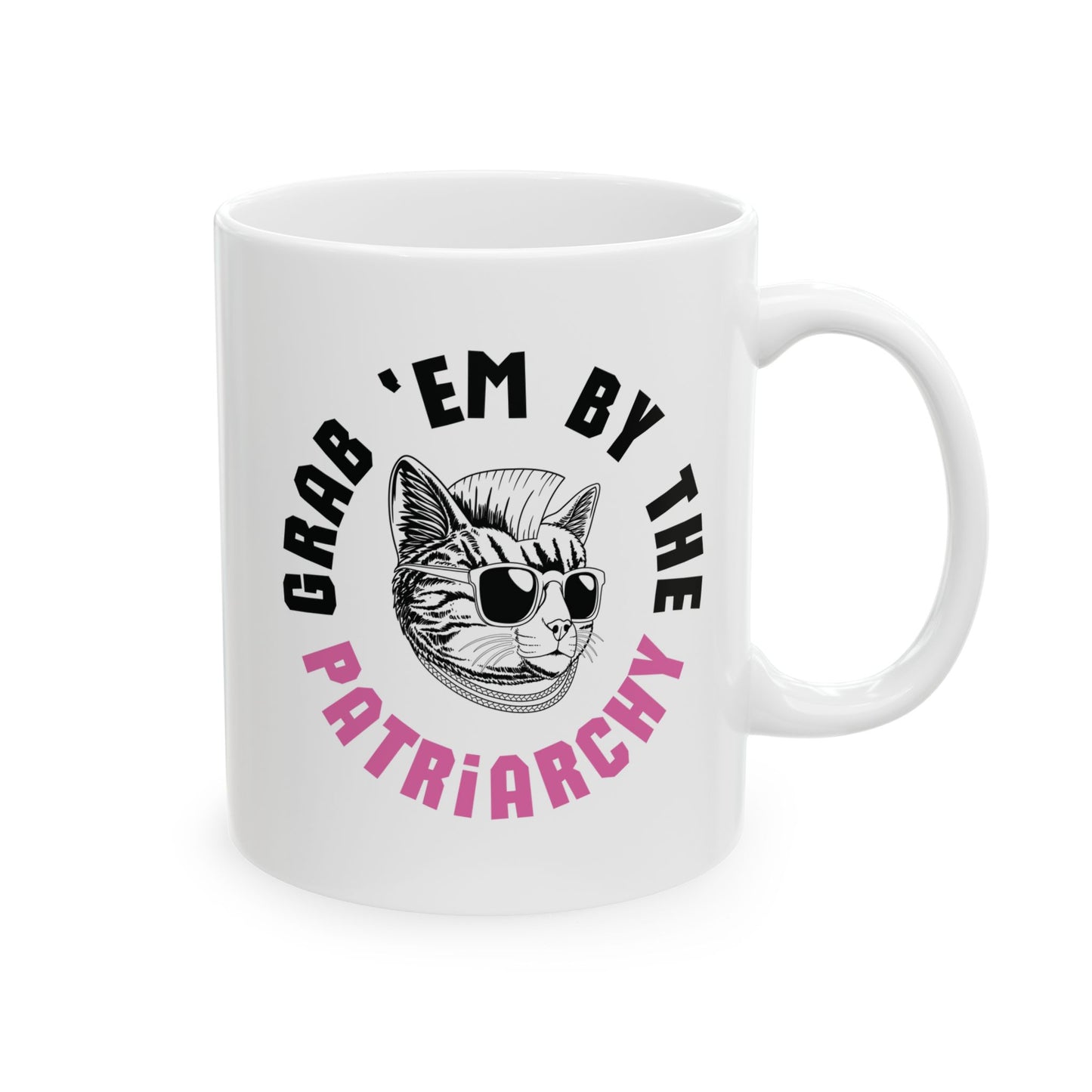 White ceramic 11 oz coffee or tea mug with punk rock cat graphic and black and pink text "grab 'em by the patriarchy"